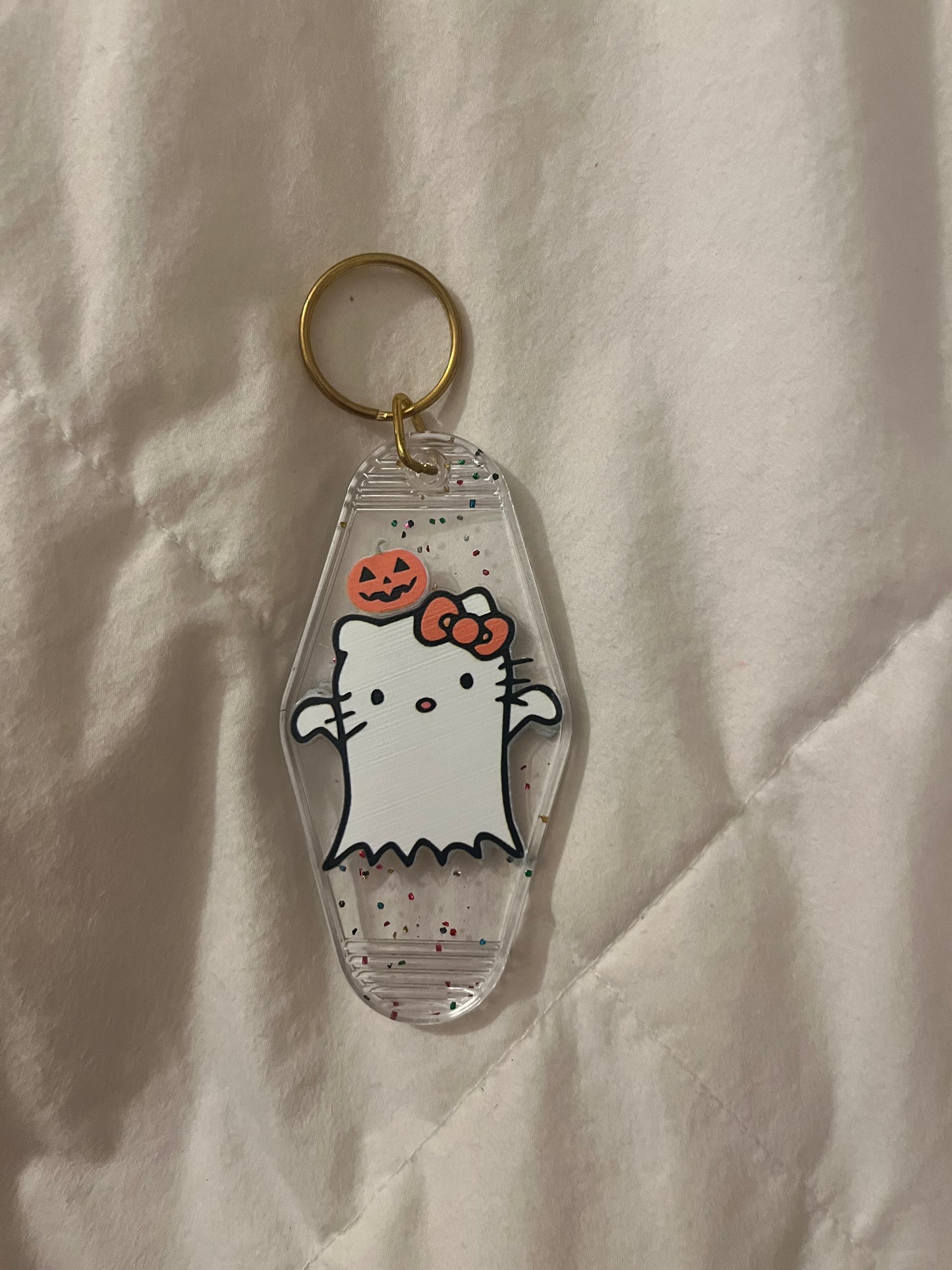 Hk clear ghost motel keychain