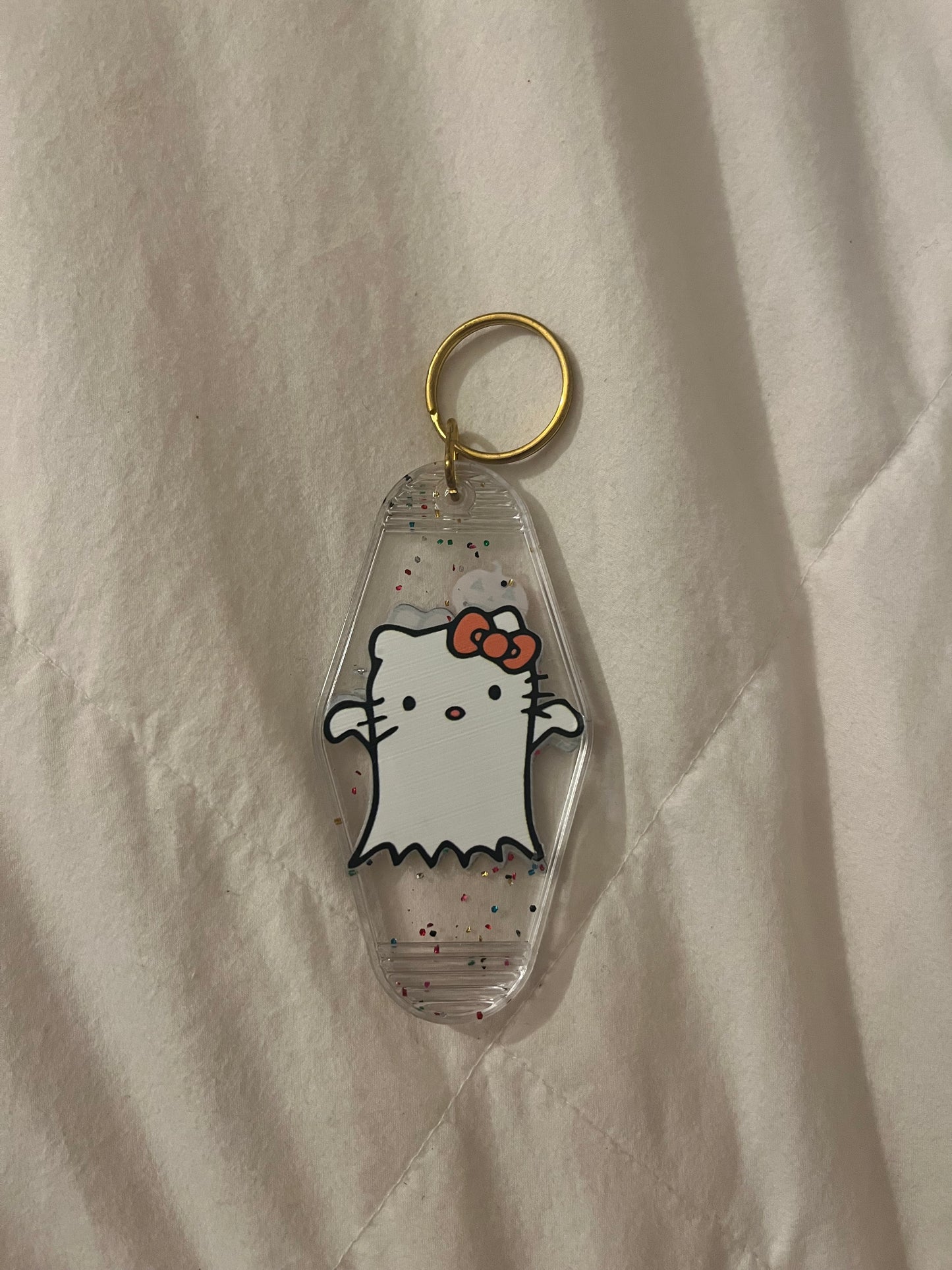 Hk clear ghost motel keychain